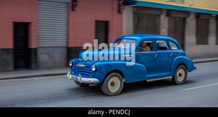 Blue American Vintage car driving Stock Photo