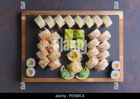 Big set of rolls on stone plate Stock Photo