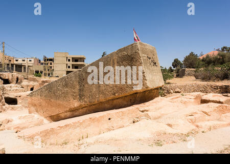 The Stone of the Pregnant is the largest carved stone in the world and lays unfinished in its quarry near the Baalbek roman temple complex, Lebanon. Stock Photo