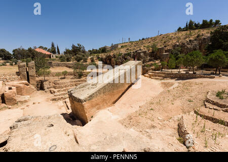 The Stone of the Pregnant is the largest carved stone in the world and lays unfinished in its quarry near the Baalbek roman temple complex, Lebanon. Stock Photo