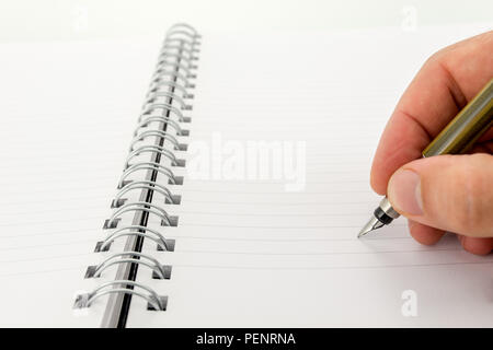 Ballpoint Pen and Blank Paper Notebook with Spiral Binding as Business Copy  Space on Yellow Background Stock Photo - Alamy