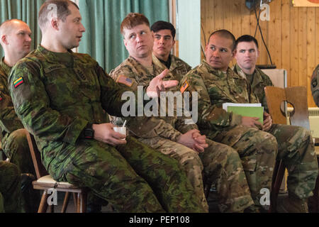 Sgt. Maj. Dainius Snarskis, the senior enlisted adviser for the Lithuanian Armed Forces, breaks down Lithuanian command structure during his visit to the General Stasys Rastikis Lithuanian Armed Forces School on Jan. 22, 2016. Snarskis was one of several Lithuanian sergeants major who welcomed noncommissioned officers from 3rd Squadron, 2nd Cavalry Regiment during their visit to the school. (U.S. Army photo by Staff Sgt. Michael Behlin) Stock Photo