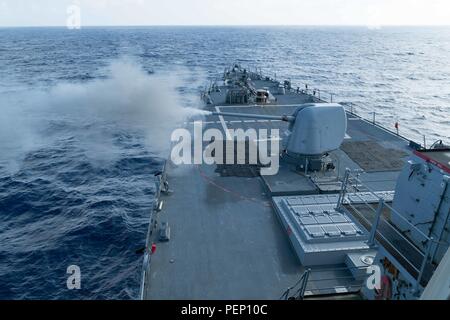 USS Curtis Wilbur conducts a live-fire exercise. (9018287170 Stock ...