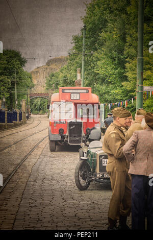 Crich Tramway Village (National Tramway Museum), Derbys 1940s weekend: WWII The Home Front, Aug 2018. Vintage street scene with vintage Bristol bus. Stock Photo