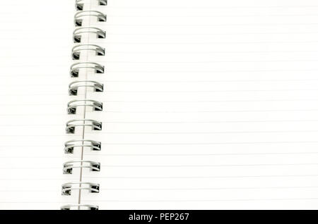 Closeup of blank spiral notebook. Empty space ready for your text or logo. Stock Photo
