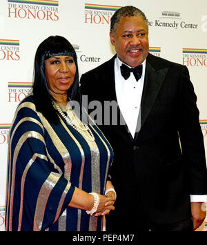 FILE: 16th Aug 2018. Aretha Franklin passes away aged 76. Photo taken: Aretha Franklin and Richard Gibbs arrive for the formal Artist's Dinner honoring the recipients of the 2012 Kennedy Center Honors hosted by United States Secretary of State Hillary Rodham Clinton at the U.S. Department of State in Washington, DC on Saturday, December 1, 2012. The 2012 honorees are Buddy Guy, actor Dustin Hoffman, late-night host David Letterman, dancer Natalia Makarova, and the British rock band Led Zeppelin (Robert Plant, Jimmy Page, and John Paul Jones).Credit: MediaPunch Inc/Alamy Live News