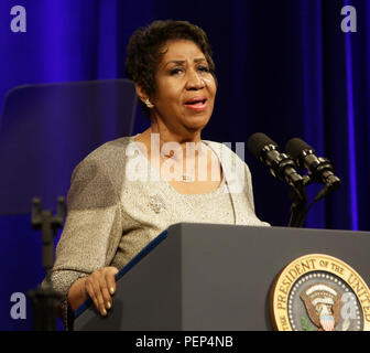 FILE: 16th Aug 2018. Aretha Franklin passes away aged 76. Photo taken: Aretha Franklin sings at the portrait unveiling ceremony for outgoing U.S. Attorney General Eric Holder at The Department of Justice in Washington, DC, February 27, 2015. Credit: Chris Kleponis/Pool via CNP/MediaPunch Credit: MediaPunch Inc/Alamy Live News Stock Photo