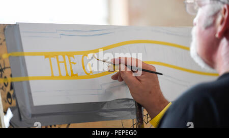 London, UK.  17 August 2018. A signwriter practices at 'Letterheads 2018:  London Calling', a gathering of international professional signwriters and lettering artists from over 30 countries.  Signwriters can network and learn new skills and visitors can see signwriting in action.  The event is taking place at the Bargehouse, Oxo Tower Wharf in central London until 19 August.  Credit: Stephen Chung / Alamy Live News Stock Photo