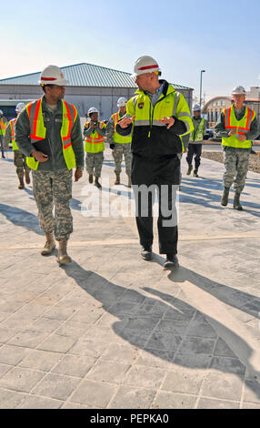 Usfk Command Engineer Col. Raymond A. Robinson, Jr., the USFK command chaplain, receives a ...