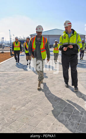 Usfk Command Engineer Col. Raymond A. Robinson, Jr., the USFK command chaplain, receives a ...