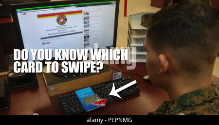 A Marine watches a YouTube video describing the details of Marine administrative message 001/16, which states that all permanent change of station travel expenses will now be paid using the government travel charge card. This change is expected to make travel more efficient and cost effective and to protect Marines from being charged interest on their personal accounts. For more information, watch the video at https://youtu.be/V7WMkMVX8GQ or contact your unit agency program coordinator. (U.S. Marine Corps photo illustration by Cpl. Michelle Reif/Released) Stock Photo