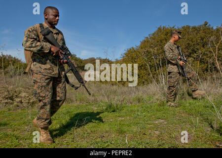 U.S. Marines with 3rd Low Altitude Air Defense Battalion patrol while conducting Tactical Site Exploitation training on Camp Pendleton, Calif., Jan. 21, 2016. Education for these events was conducted by Training Support Division, which provides guidance to prepare Marines in realistic environments for operational utilization. (U.S. Marine Corps Photo by Lance Cpl. Roderick Jacquote/Released) Stock Photo