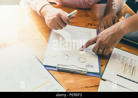 Business team meeting and discussing project plan. Businessmen discussing together in meeting room. Professional investor working with business projec Stock Photo