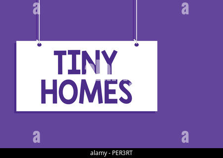 Conceptual hand writing showing Tiny Homes. Business photo showcasing houses contain one room only or two and small entrance Cheap Hanging board messa Stock Photo