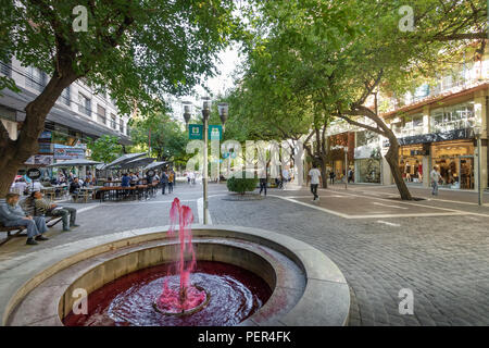 Paseo Sarmiento pedestrian street fountain with red water like wine - Mendoza, Argentina Stock Photo