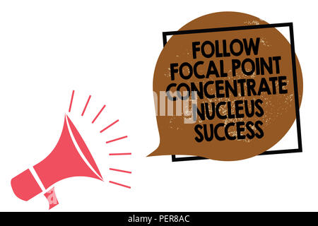 Handwriting text writing Follow Focal Point Concentrate Nucleus Success. Concept meaning Concentration look for target Megaphone loudspeaker speaking  Stock Photo