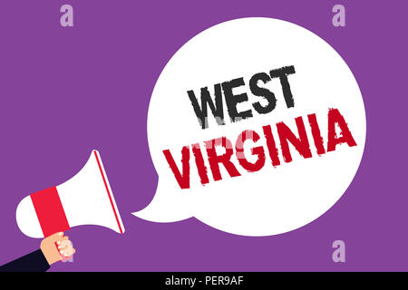 Handwriting text writing West Virginia. Concept meaning United States of America State Travel Tourism Trip Historical Man holding megaphone loudspeake Stock Photo