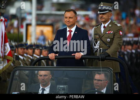 Warsaw, Poland. 15th Aug, 2018. Military parade held on Army Celebration Day during 100th Celebrations of Poland's Independence. Over 2000 Polish and NATO soldiers took part in the march at the riverside of Vistula. President Andrzej Duda, Prime Minister Mateusz Morawiecki, Marshall of Sejm Marek Kuchcinski, Marshall of Senate Stanisalaw Karczewski and Minister of Defense Mariusz Blaszczak joined parade in the capital. Credit: Jakob Ratz/Pacific Press/Alamy Live News Stock Photo