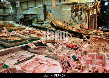 KYOTO, JAPAN - NOVEMBER 27, 2016: Japanese sea food at Nishiki Market in Kyoto, Japan. Nishiki is a popular traditional food market in Kyoto. Stock Photo