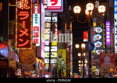 OSAKA, JAPAN - NOVEMBER 21, 2016: Night city lights of Dotonbori street in Osaka, Japan. Dotonbori is the main entertainment area of Osaka. Stock Photo