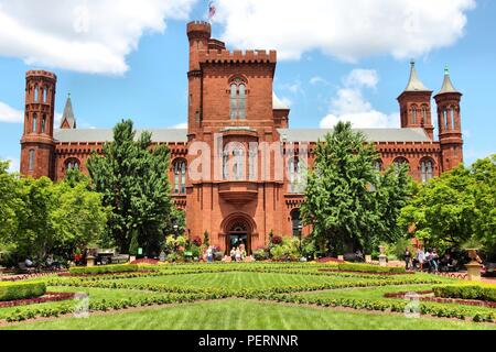 WASHINGTON, USA - JUNE 14, 2013: People visit the Smithsonian Institution in Washington DC. 18.9 million tourists visited capital of the United States Stock Photo