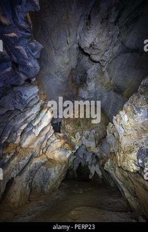 Inside the dark Tham Hoi Cave near Vang Vieng, Vientiane Province, Laos. Stock Photo