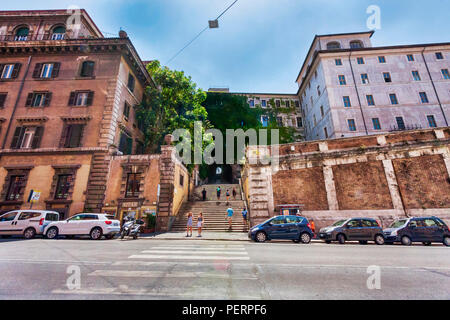 Rome,Italy - July 19, 2018:Tourists climb the ancient staircase under Palazzo Borgia to lead to San Pietro in Vincoli square in Monti district in Rome Stock Photo