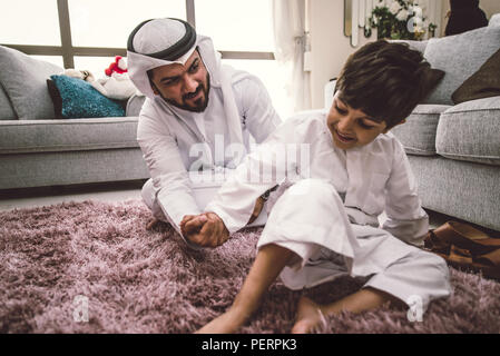 Arabic happy family lifestyle moments at home Stock Photo