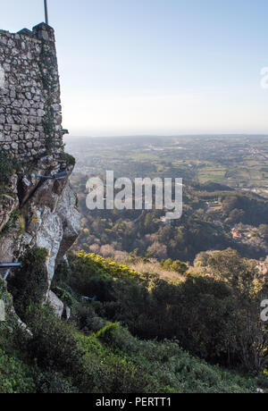 Lisbon, Portugal - March 13, 2016: The ruins of the Moorish Castle on the mountaintop in Pena Park, Sintra. Stock Photo