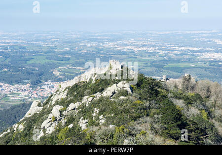 Lisbon, Portugal - March 13, 2016: The ruins of the Moorish Castle on the mountaintop in Pena Park, Sintra. Stock Photo