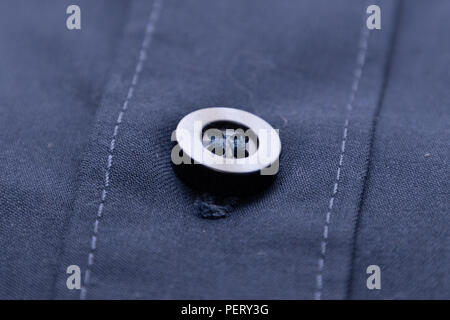 Mottled fabric denim style fine stuff soft material with button Stock Photo