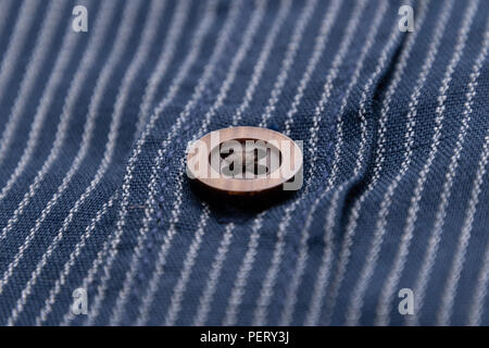 Mottled fabric denim style fine stuff soft material with button Stock Photo