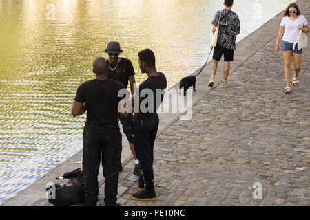 Paris street scene Canal Saint Martin - a street scene at the Canal Saint Martin in the 10th arrondissement. France, Europe. Stock Photo