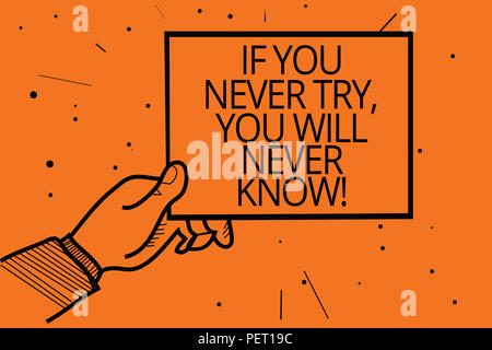 Writing note showing If You Never Try, You Will Never Know. Business photo showcasing Inspiration to make new thing Man hand holding paper communicati Stock Photo