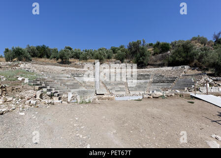 View of the small theatre of Ancient Epidaurus in the town of Palaia Epidaurus. Peloponnese, Greece. Re-discovered in 1970 the theatre dates to the mi Stock Photo