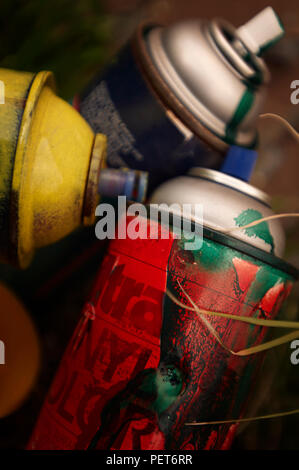 Graffiti spray paint cans used and discarded Stock Photo - Alamy