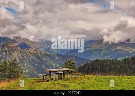 Landscape of mountain range Sarntal Alps with picnic site in the foreground, South Tyrol Stock Photo