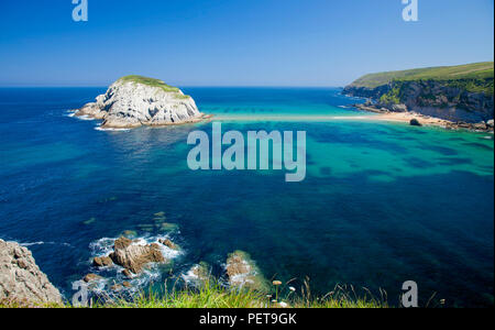 Cantabria, coastal landscape along Costa Quebrada, The Broken Coast, spectacular beach Playa de Los Covachos, sandbanks partially exposed by low tide Stock Photo