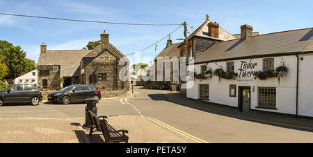 Wide angle view of the Old Swan Inn on the right and the White Hart, two old public houses in Llantwit Major, Wales Stock Photo