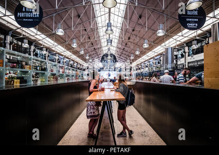 Time Out Market is a food hall located in Mercado da Ribeira at Cais do Sodre in Lisbon, Portugal Stock Photo