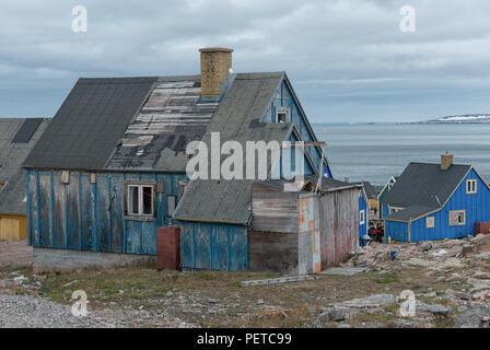 Colourful wooden houses overlooking the Greenland Sea in autumn, Ittoqqortoormiit, Sermersooq Municipality, Eastern Greenland, Kingdom of Denmark Stock Photo
