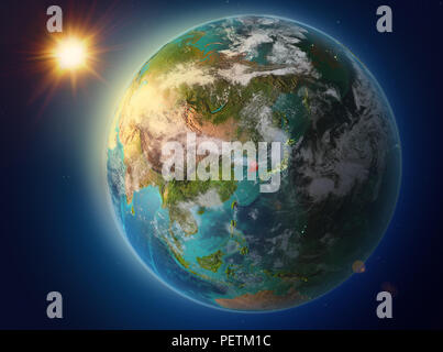 Sunrise above South Korea highlighted in red on model of planet Earth ...
