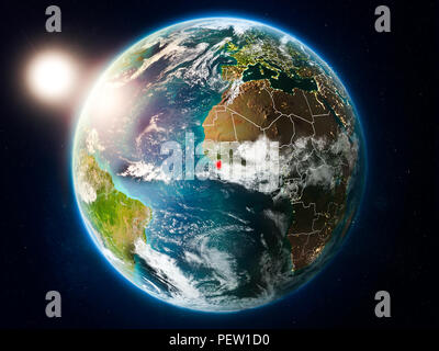 Sunrise above Sierra Leone highlighted in red on model of planet Earth ...