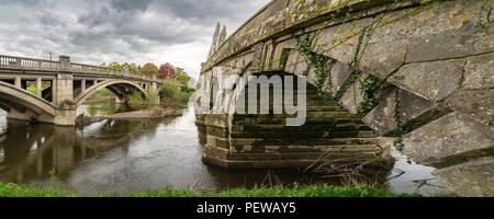 The old bridge and Atcham Bridge over the River Severn in Atcham, near Shrewsbury, Shropshire, England, UK Stock Photo