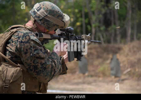 Marine Machine Gunner Fast Roping A U.S. Marine machine gunner conducts a speed reload drill in Israel ...