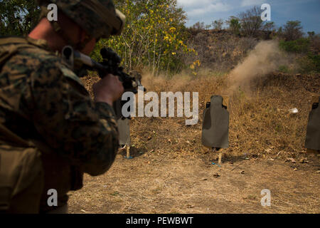 Marine Machine Gunner Fast Roping A U.S. Marine machine gunner conducts a speed reload drill in Israel ...