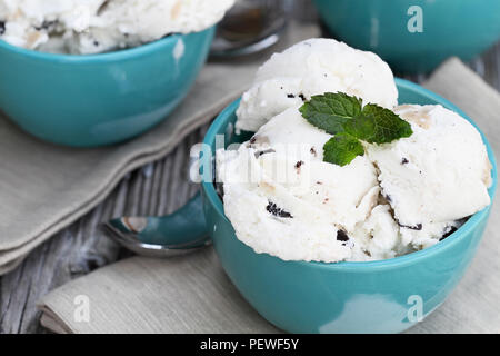 Three bowls of chocolate chip cookie dough ice cream viewed from above. Extreme shallow depth of field with selective focus on bowl in front. Stock Photo