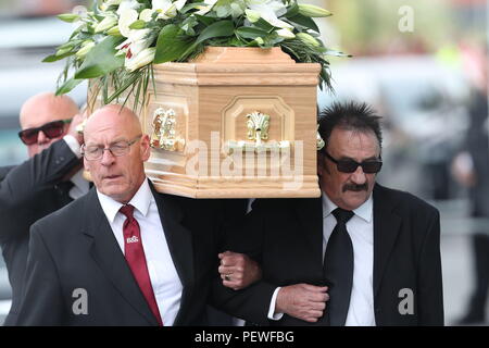 Paul Elliott (right) carries the coffin of his brother Barry Chuckle, 73, (real name Barry Elliott) at the New York Stadium, Rotherham, following his death on Sunday August 5. Stock Photo