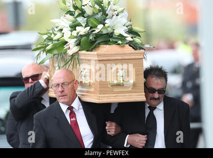 Paul Elliott (right) carries the coffin of his brother Barry Chuckle, 73, (real name Barry Elliott) at the New York Stadium, Rotherham, following his death on Sunday August 5. Stock Photo
