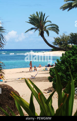 People on Sunset Beach, North Shore, Oahu, Hawaii Stock Photo